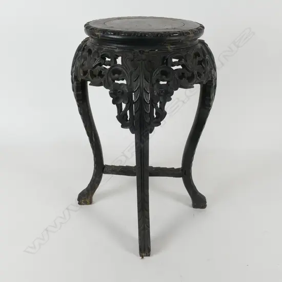 A 19thC Chinese blackened hardwood plant stand