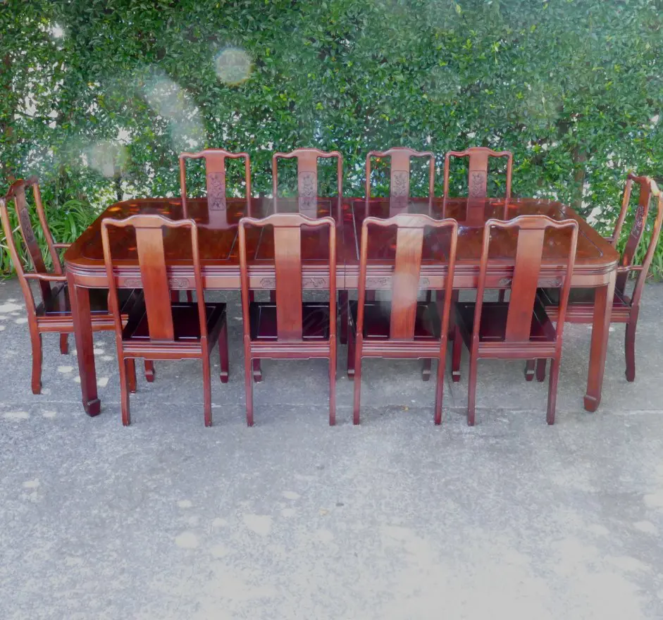 A Chinese rosewood extension banquet dining table and ten chairs Image 1++