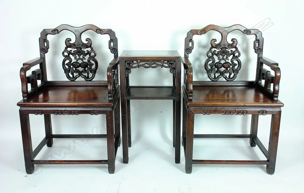 A pair of late 19th/early 20thC Chinese rosewood Tai Shi armchairs and matching tea table Image 1++