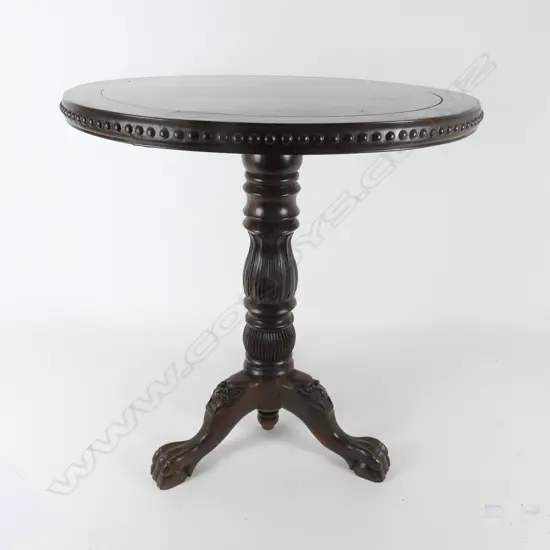 An exotic amboyna circular occasional table