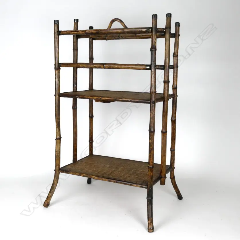 A Victorian mottled bamboo and rattan two-stage magazine rack Image 1++