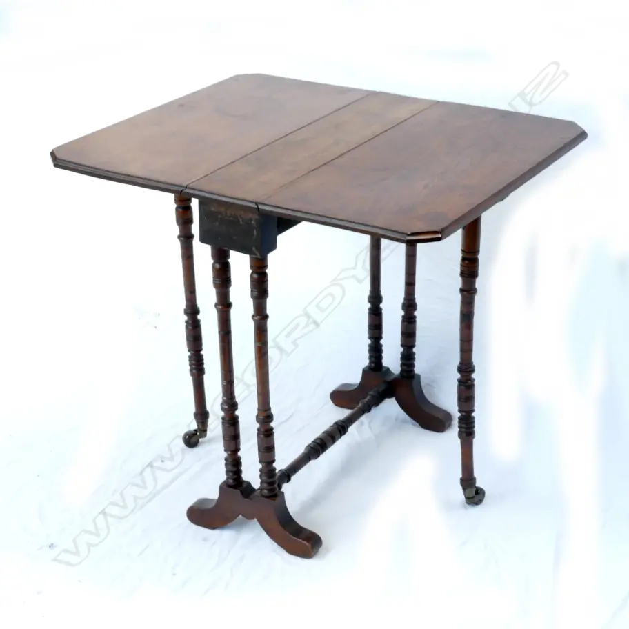 A miniature late Victorian mahogany Sutherland table on turned supports. Width 540 Image 1++