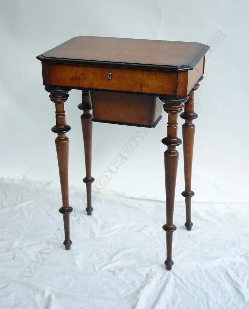 A 19thC European burr walnut work table Image 1++