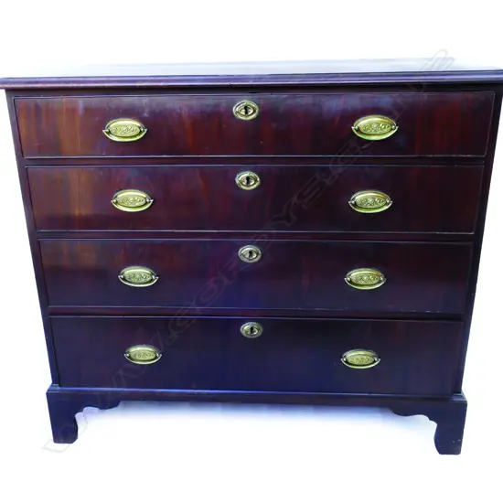 A Georgian mahogany flat front chest of drawers