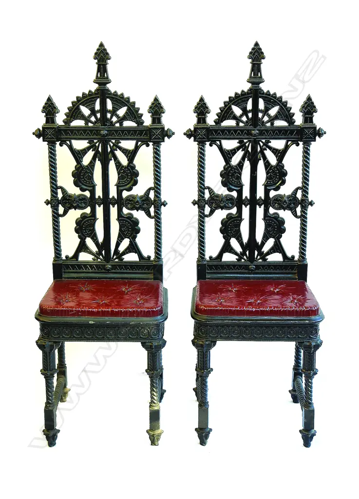 A pair of  Coalbrookdale cast iron hall chairs designed by Christopher Dresser c.1870 in the 'Lily' pattern Image 1++