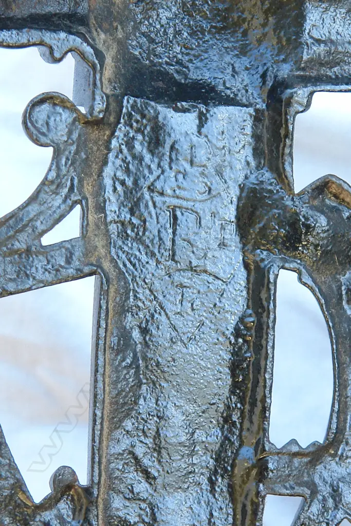 A pair of  Coalbrookdale cast iron hall chairs designed by Christopher Dresser c.1870 in the 'Lily' pattern Image 1++