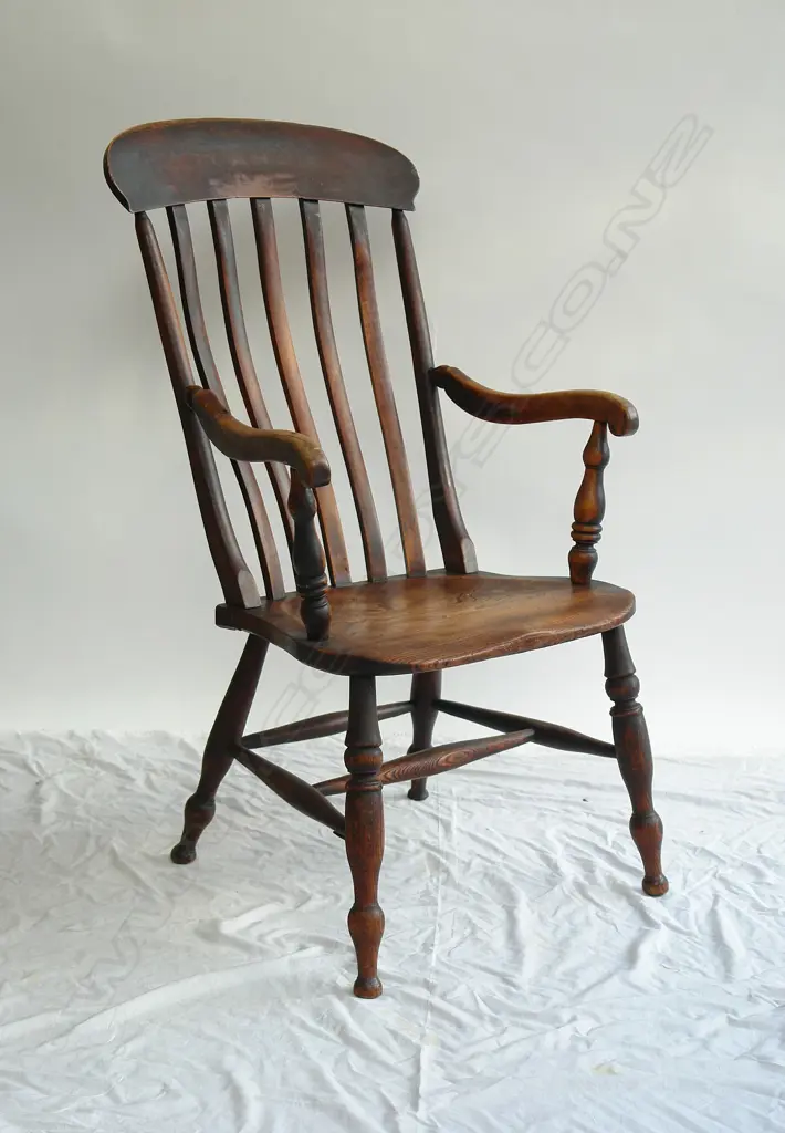 An early 19thC country elm and beech stick-back armchair Image 1++