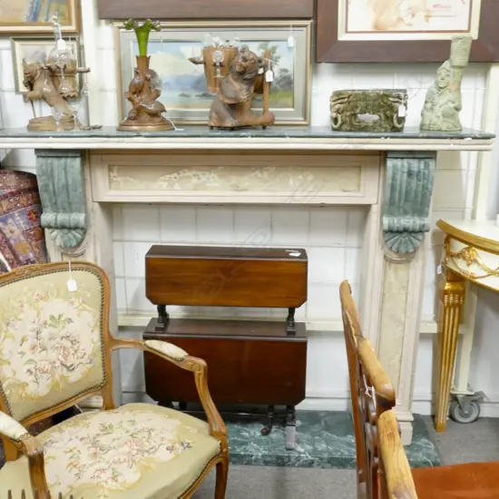 A classical coloured marble fire surround