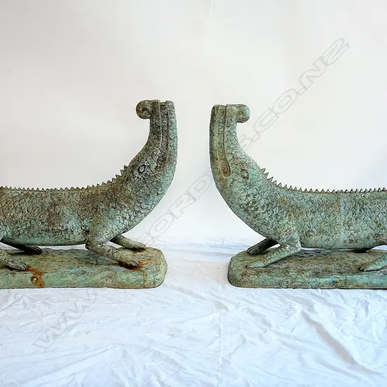 A pair of metal ornamental garden crocodiles with verdigris patina