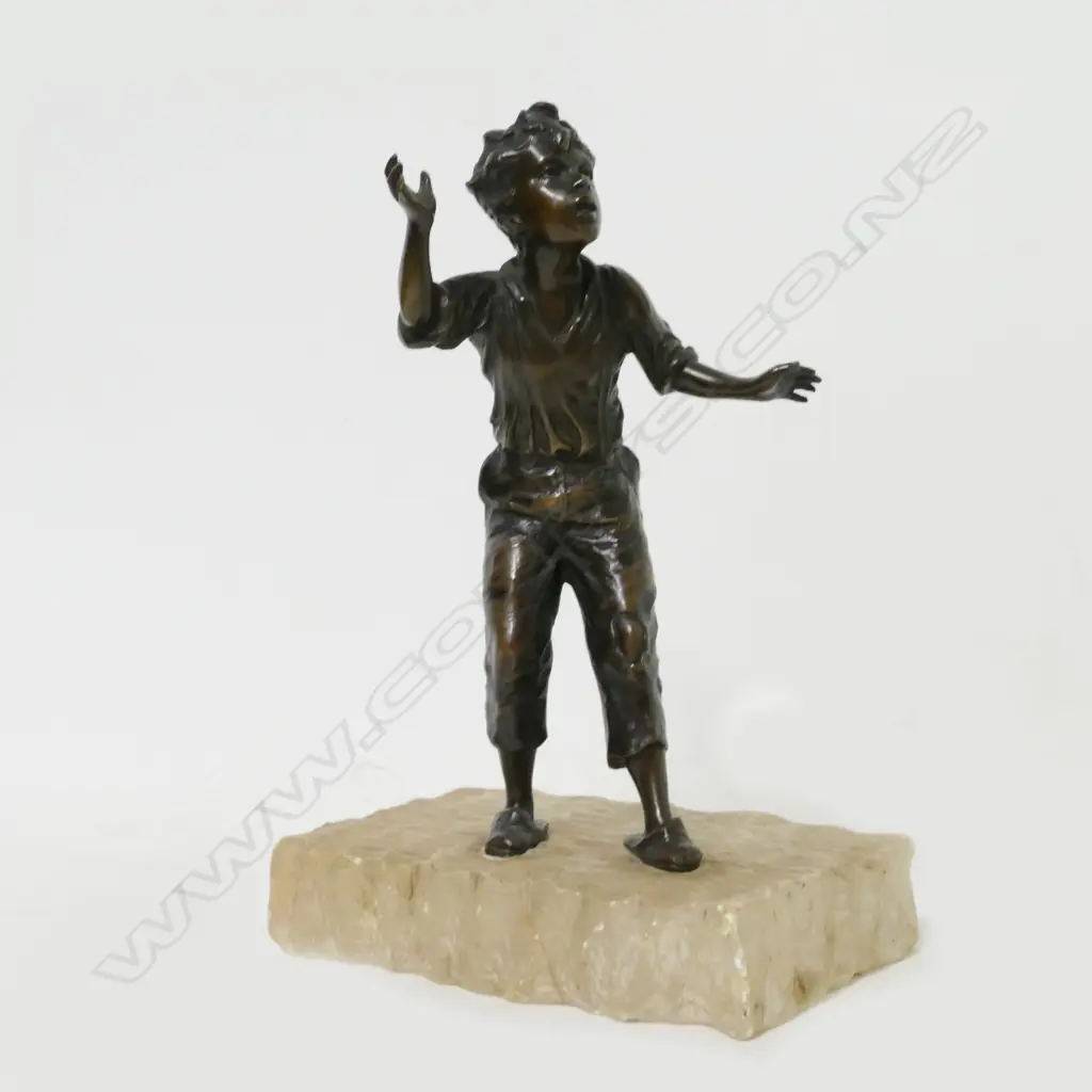 A small bronze study of a young boy Image 1++