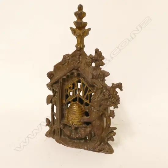 A vintage cast iron money box