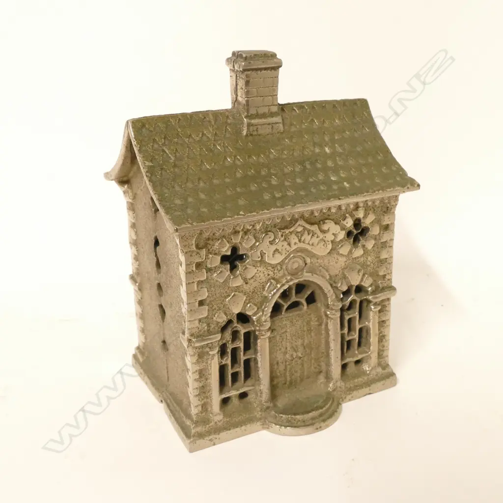 A vintage cast iron nickel plate money bank Image 1++