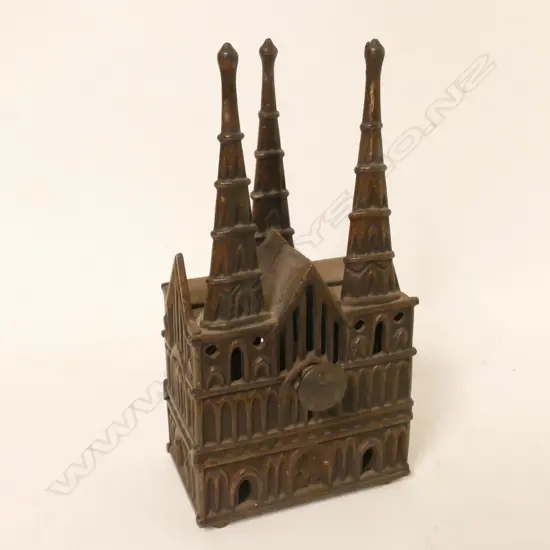 A vintage cast iron money box