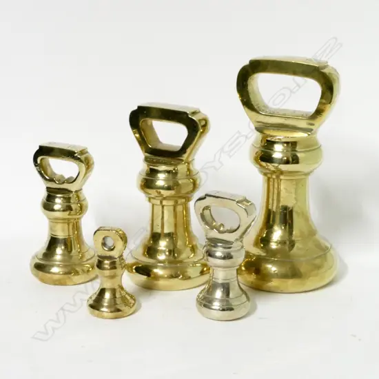 Five brass Avery weights