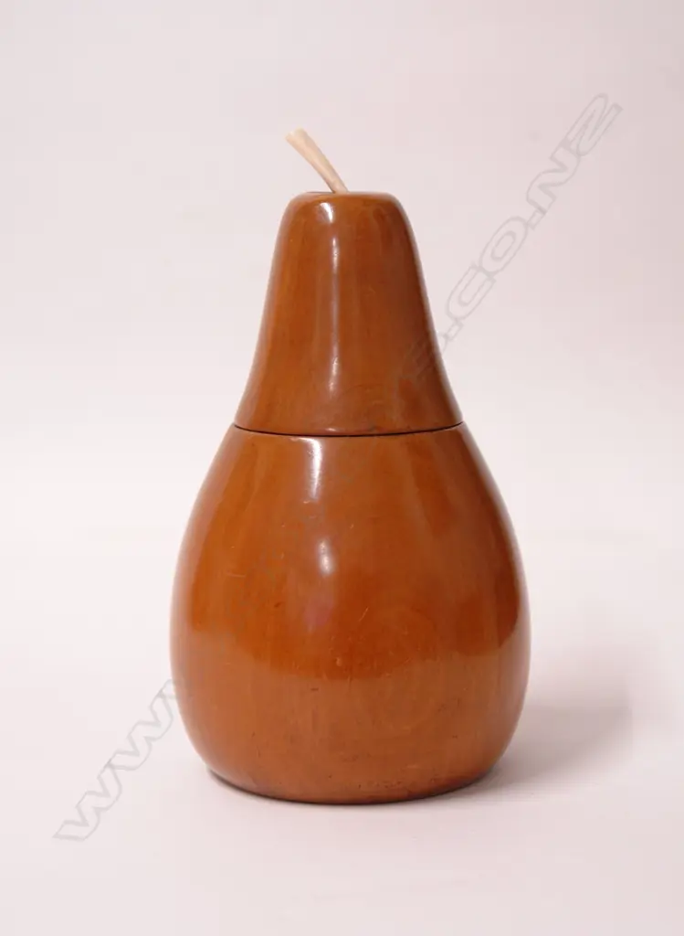 A pear shaped fruitwood tea caddy in the antique manner Image 1++