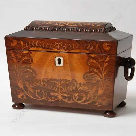 A Regency rosewood inlaid tea caddy