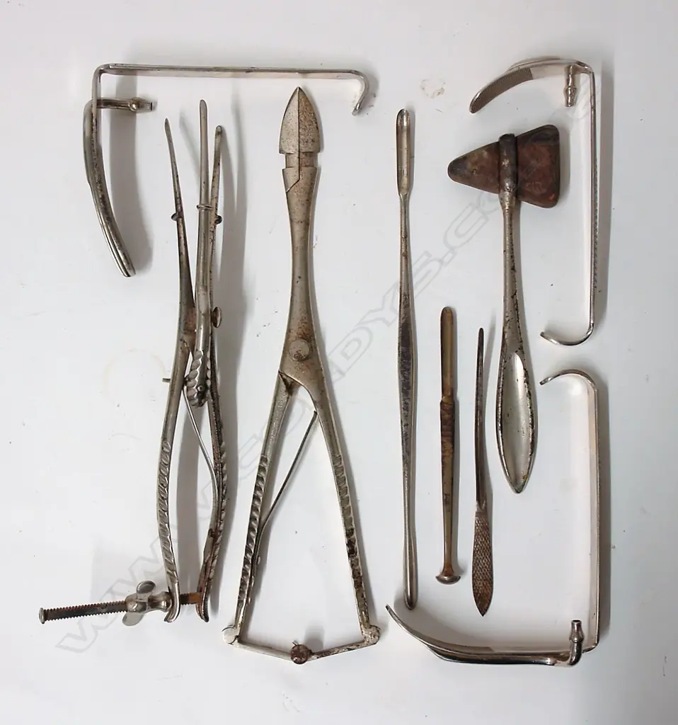 A selection of nine vintage surgical tools Image 1++