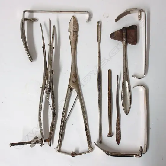 A selection of nine vintage surgical tools