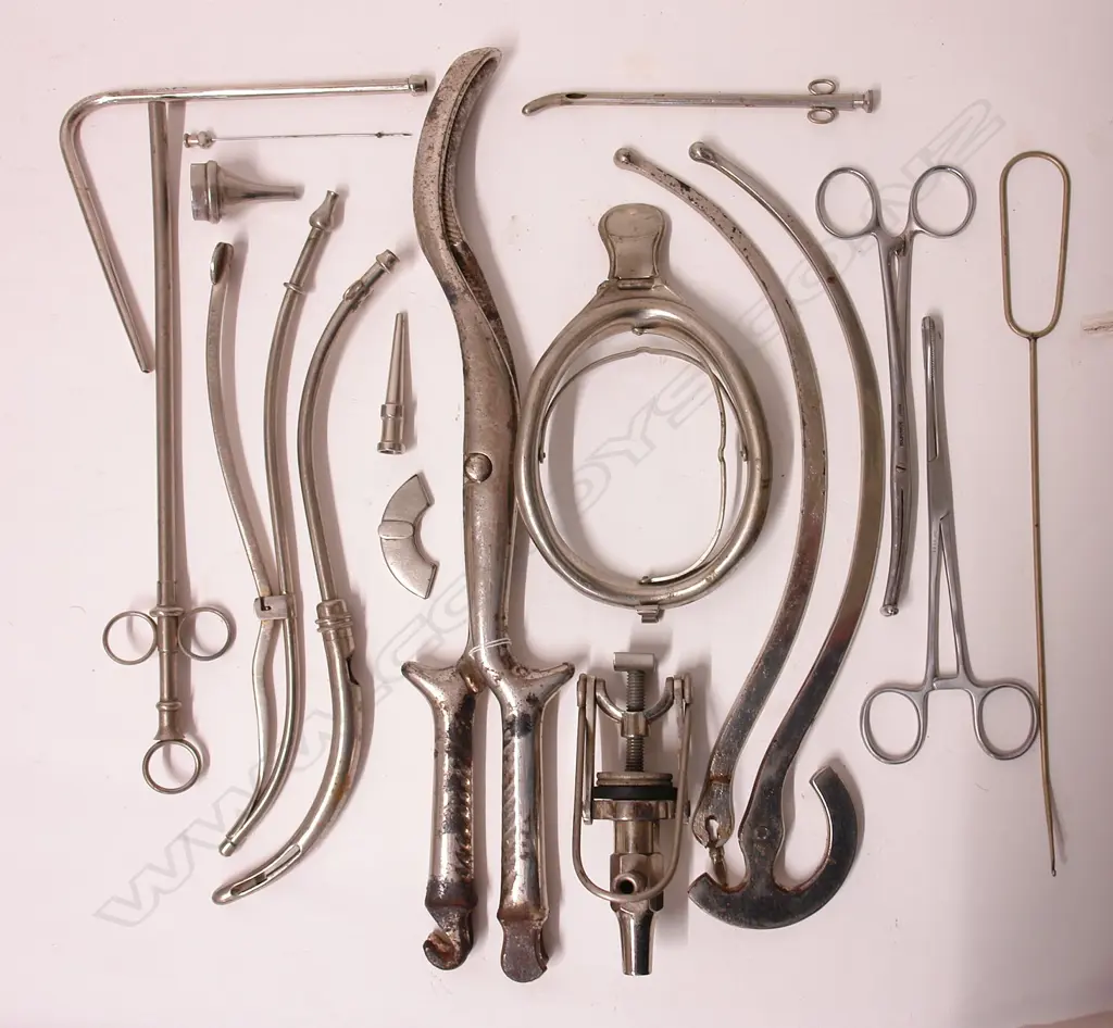 A selection of vintage obstetric tools Image 1++