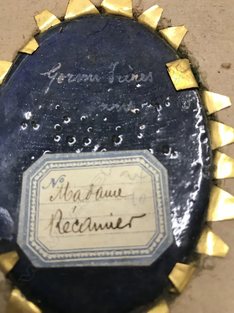 A pair of hand painted enamel portrait miniatures Image 1++