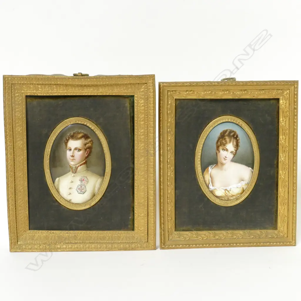 A pair of hand painted enamel portrait miniatures Image 1++