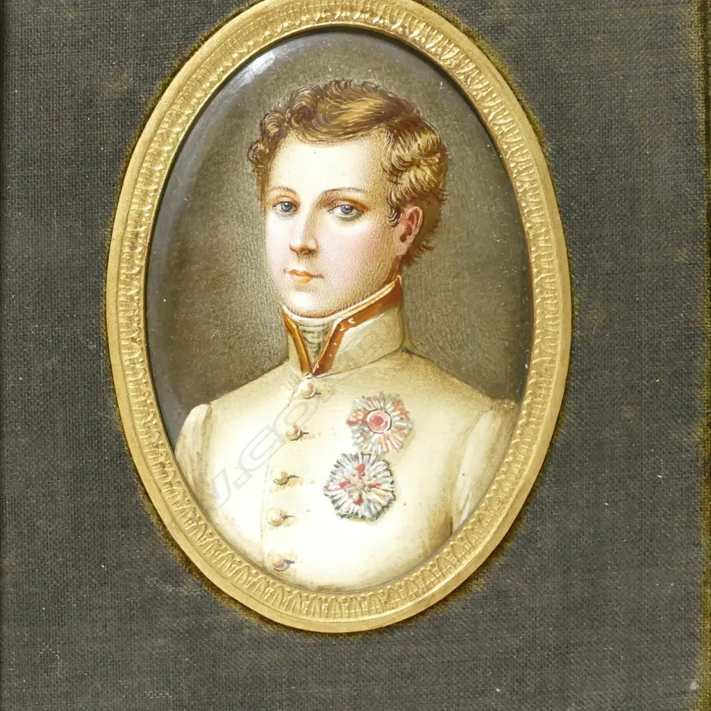 A pair of hand painted enamel portrait miniatures Image 1++