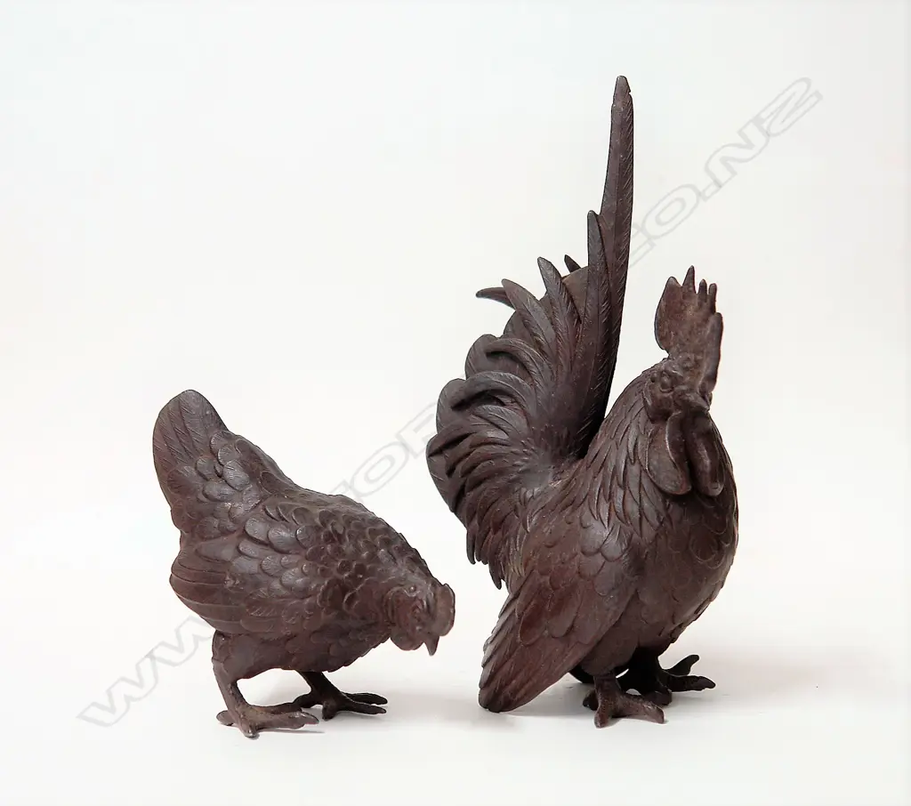 An early 20thC bronzed metal rooster and hen Image 1++