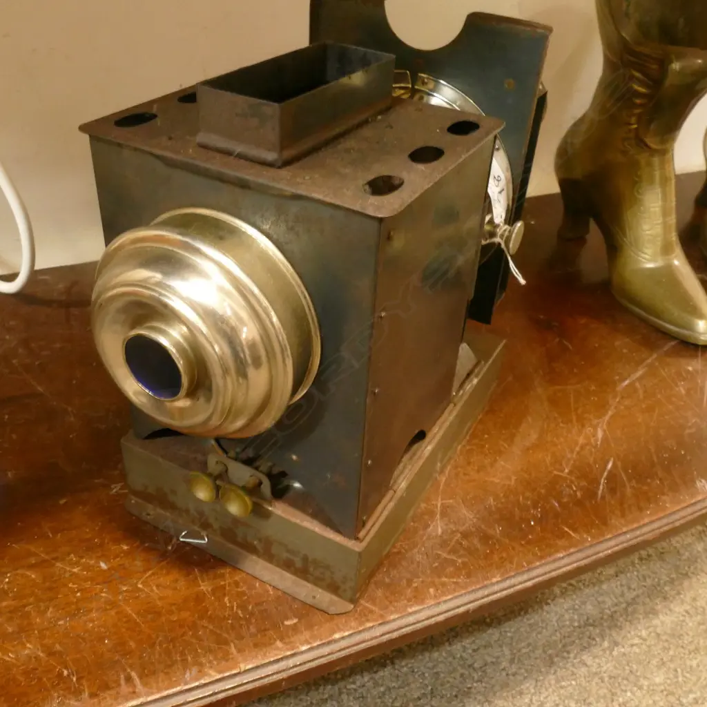 A vintage tin and chrome magic lantern Image 1++