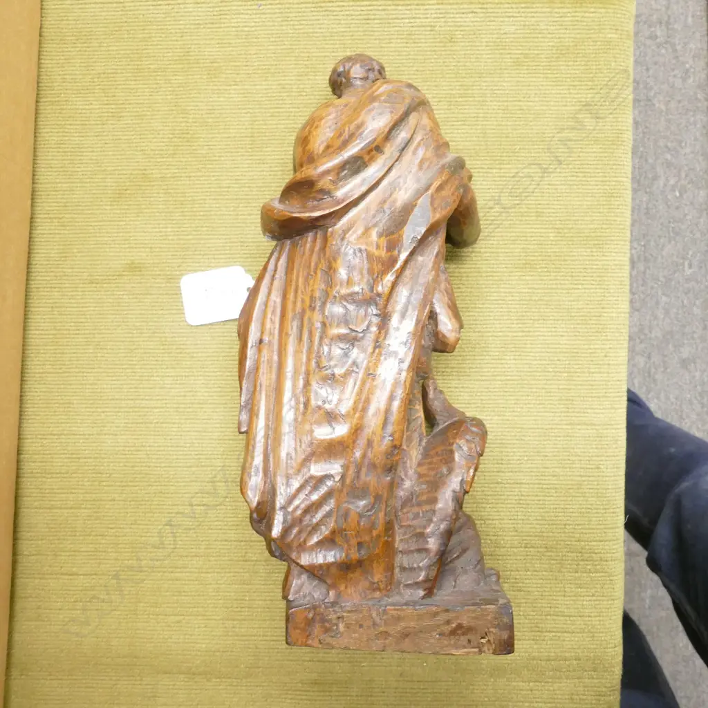 A 17thC French carved walnut statue of the evangelist St John Image 1++