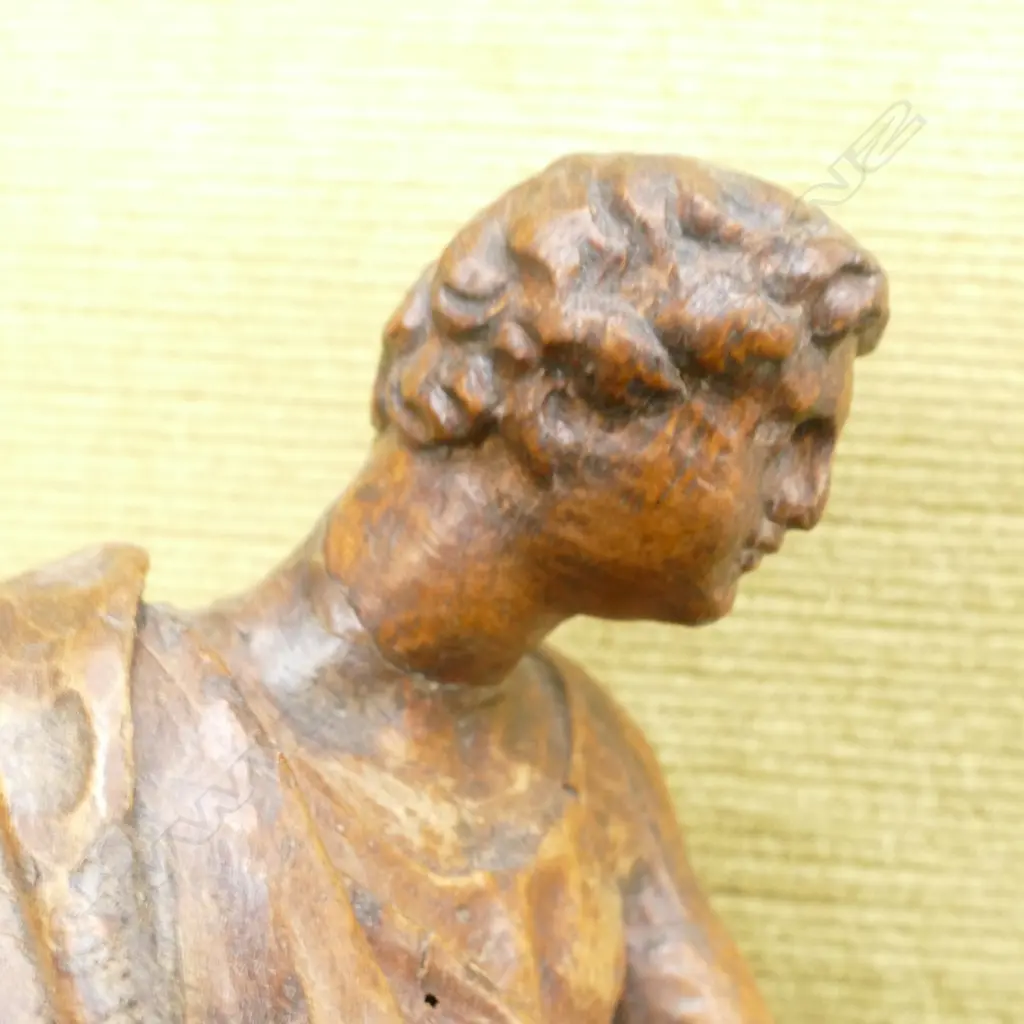 A 17thC French carved walnut statue of the evangelist St John Image 1++