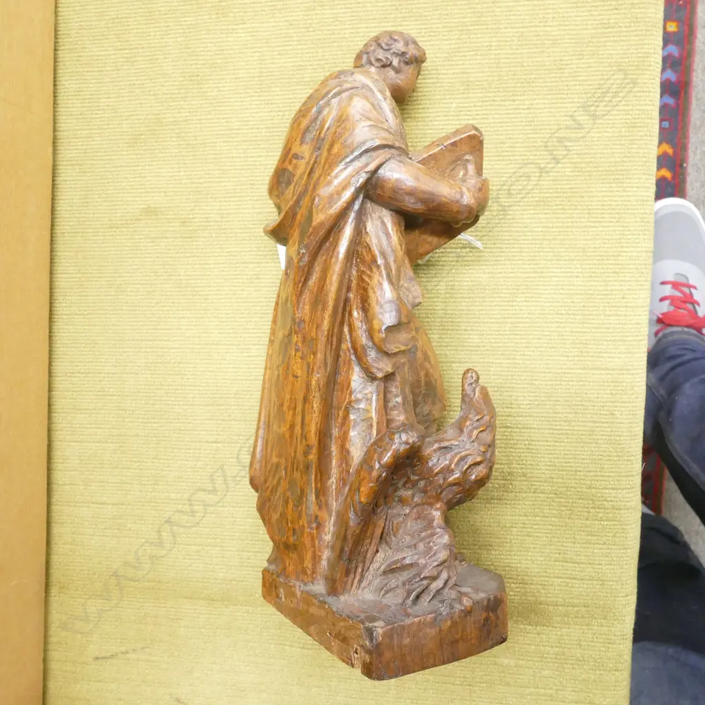 A 17thC French carved walnut statue of the evangelist St John Image 1++