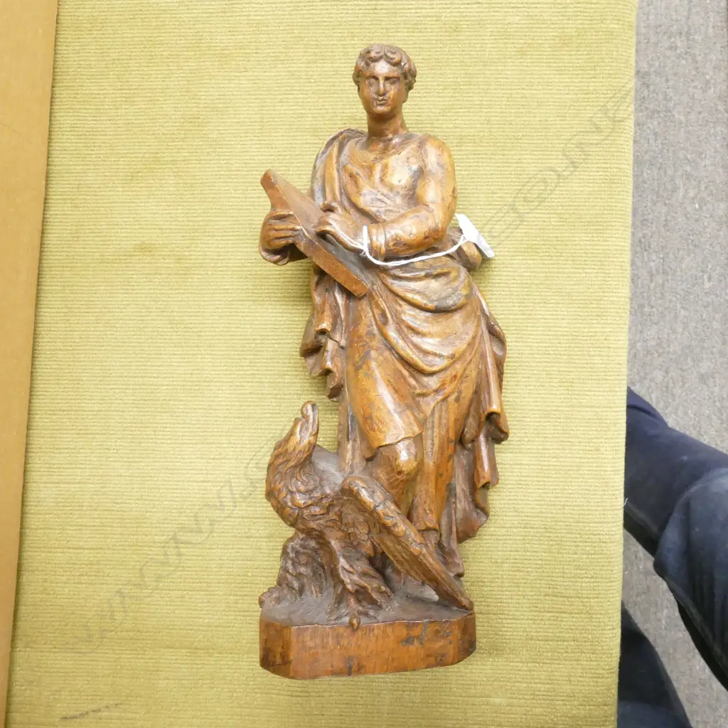 A 17thC French carved walnut statue of the evangelist St John Image 1++