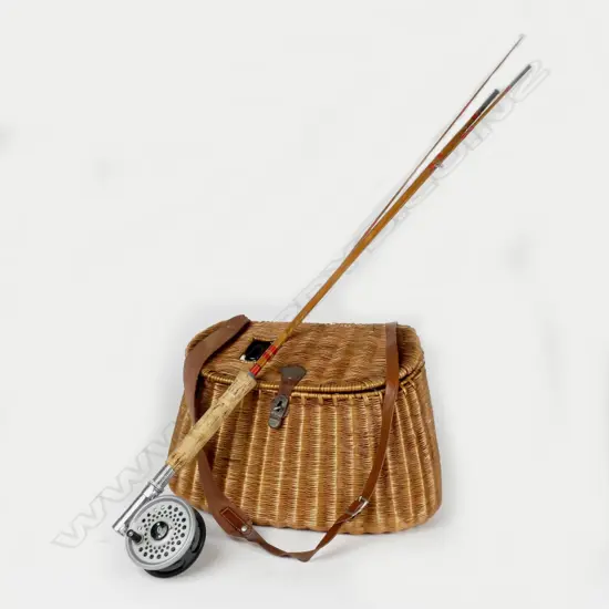 An old fishing creel and a 3⅝" 'Intrepid Rimfly' rod and reel