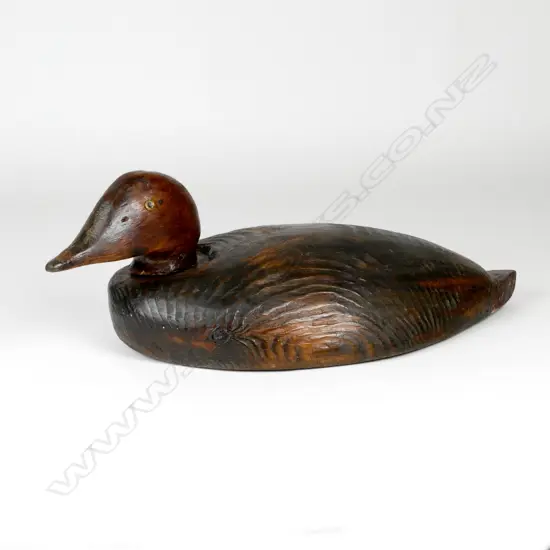 A Magnum sized wooden duck decoy