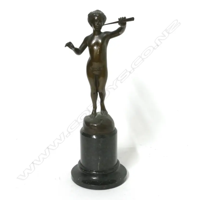 A small bronze figure sculpture Image 1++