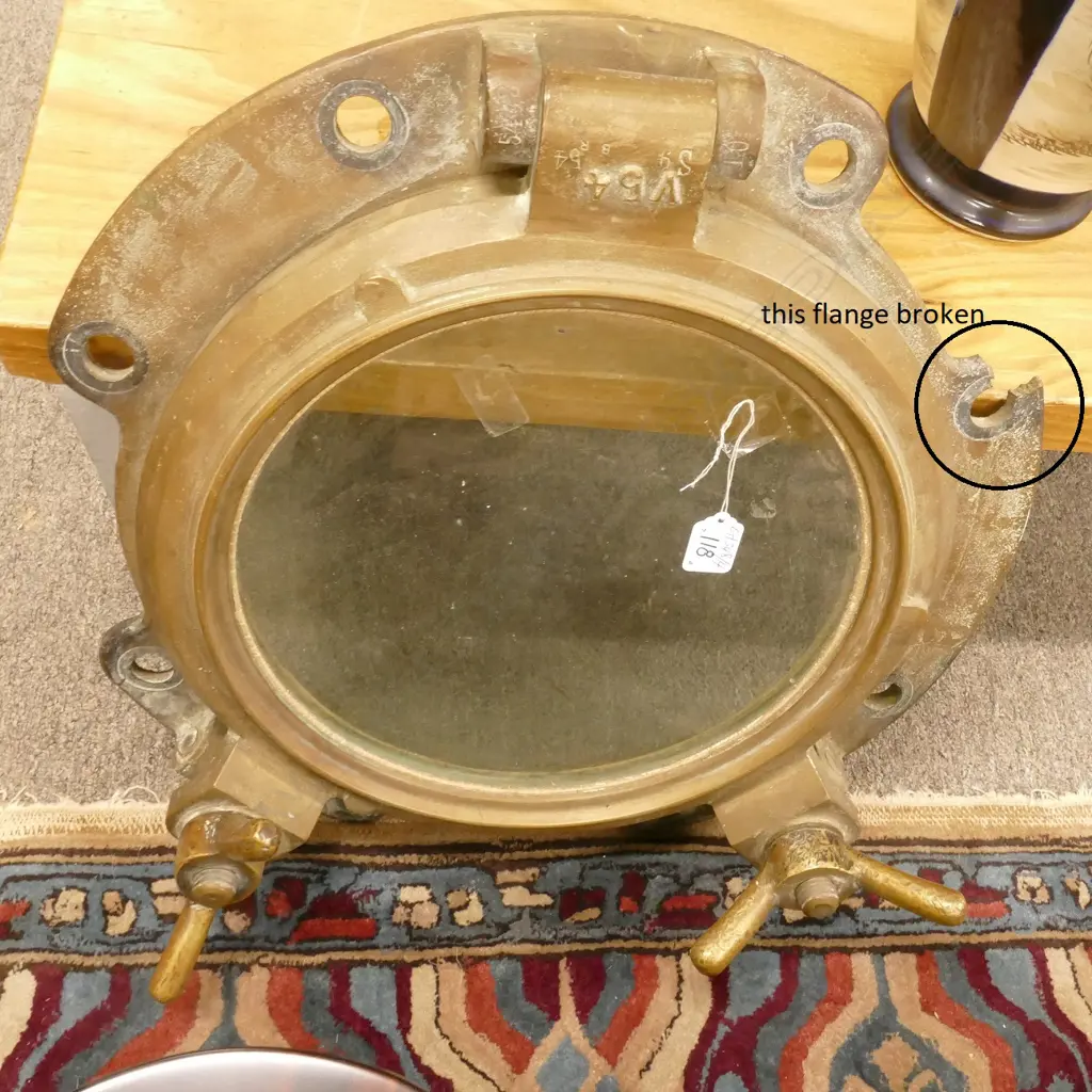 An old brass ship's porthole window Image 1++