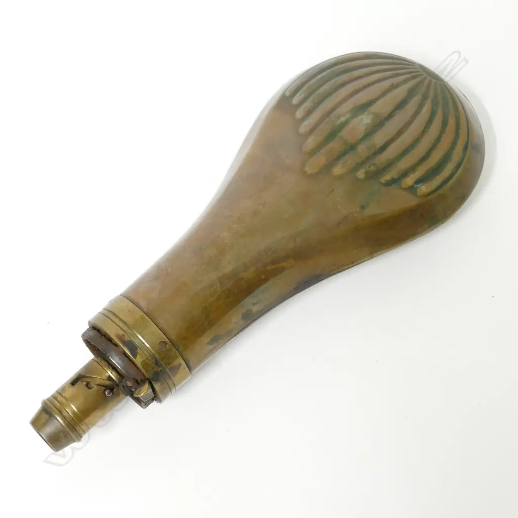 A brass and copper powder flask Image 1++
