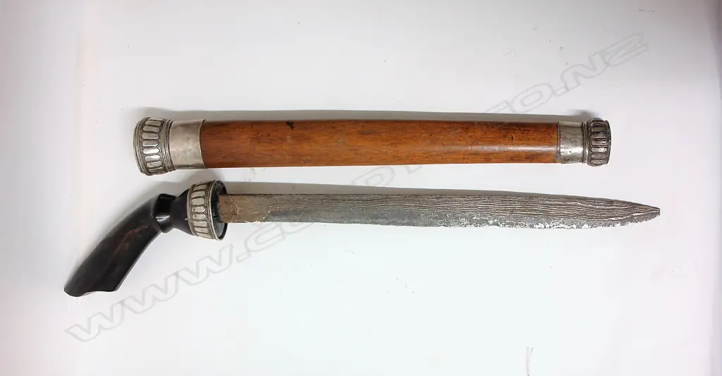 A vintage Indonesian badik knife and scabbard Image 1++