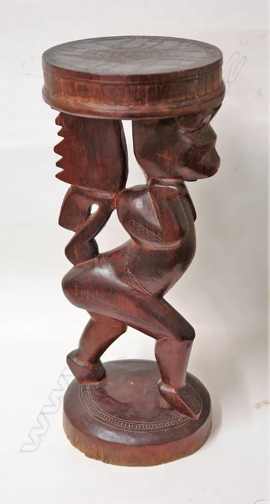 A Trobriand hardwood stool Image 1++