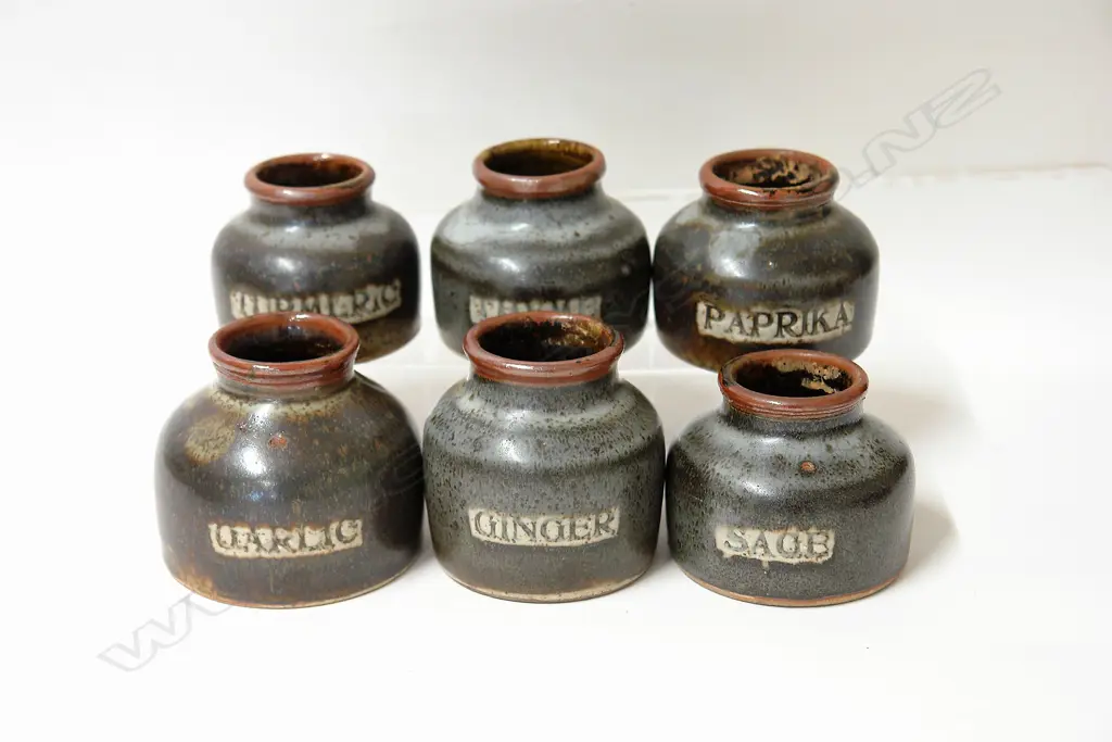 A set of six Len Castle studio pottery spice jars Image 1++