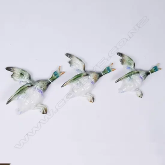 Three Titian wall ducks