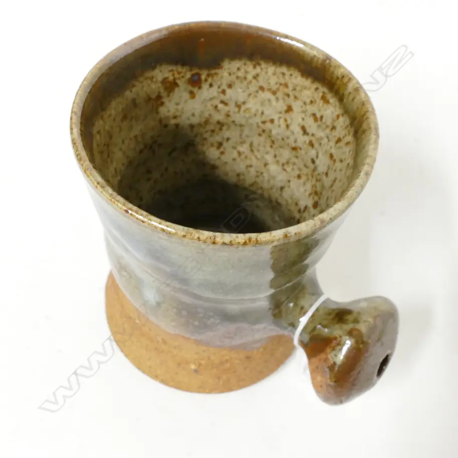 A set of four Barry Brickell mugs Image 1++