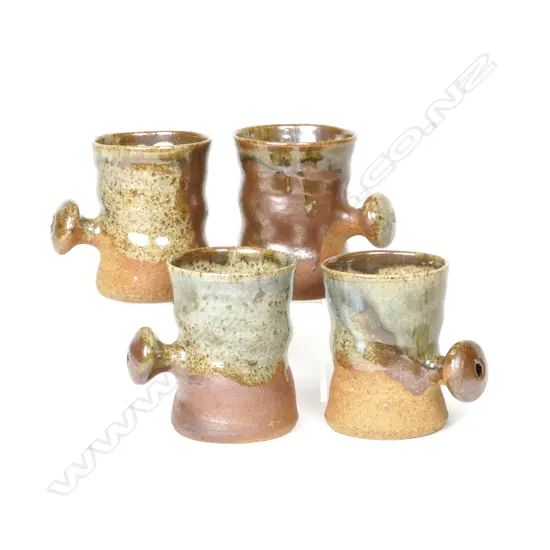 A set of four Barry Brickell mugs