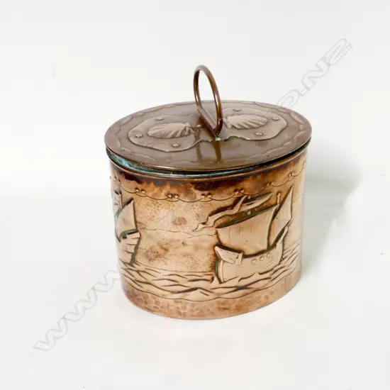 An Arts & Crafts copper tea caddy