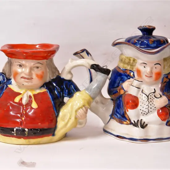 Two 19thC Staffordshire figured teapots