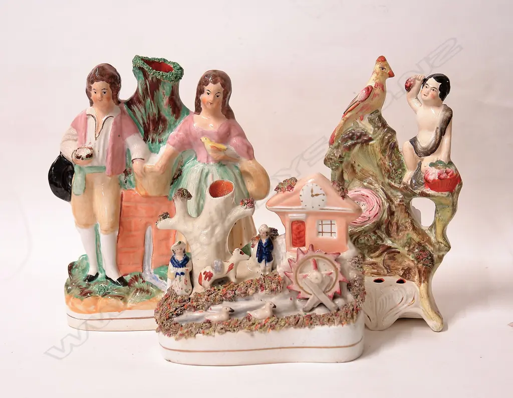 Three Victorian Staffordshire figure groups Image 1++