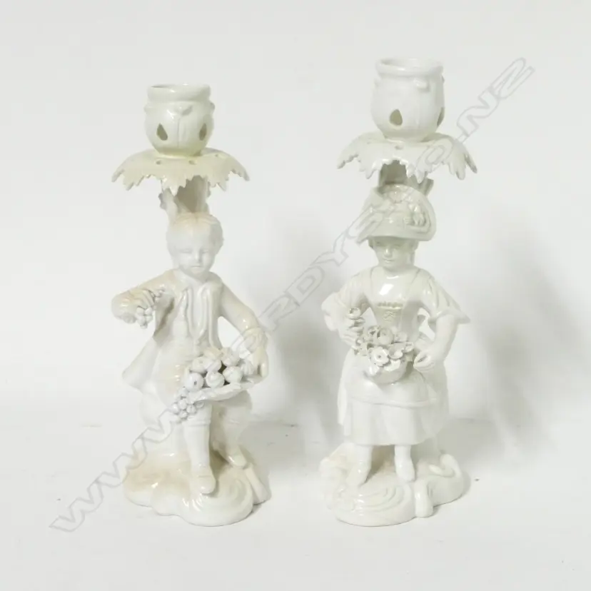 A pair of Derby whiteware figural candlesticks Image 1++