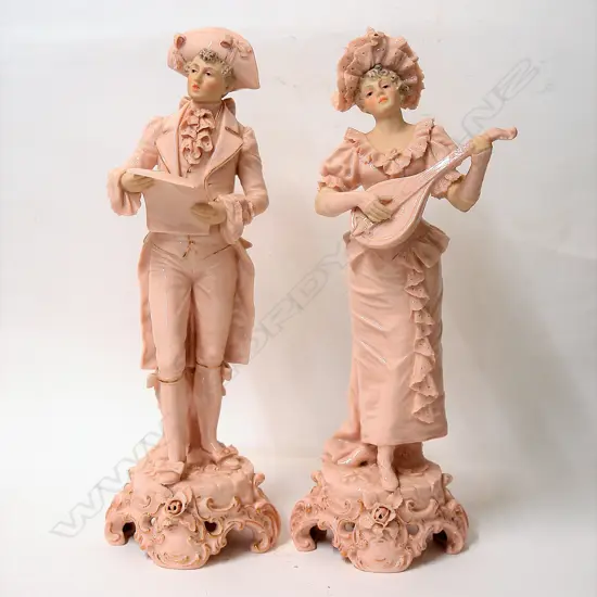 A pair of Royal Dux figures
