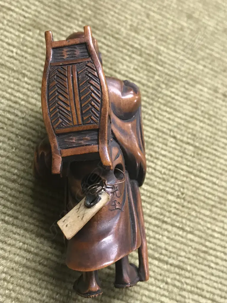 An old finely carved Japanese boxwood netsuke of a Sennin Image 1++