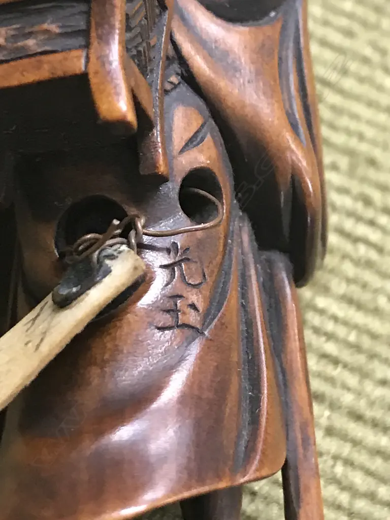 An old finely carved Japanese boxwood netsuke of a Sennin Image 1++